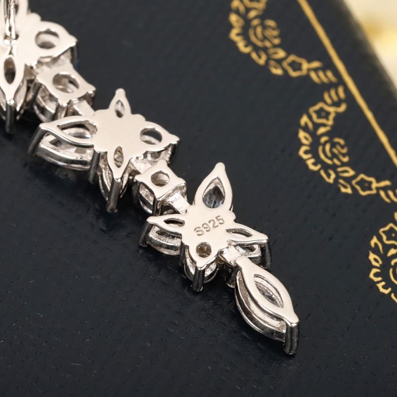 T*f*ny earrings